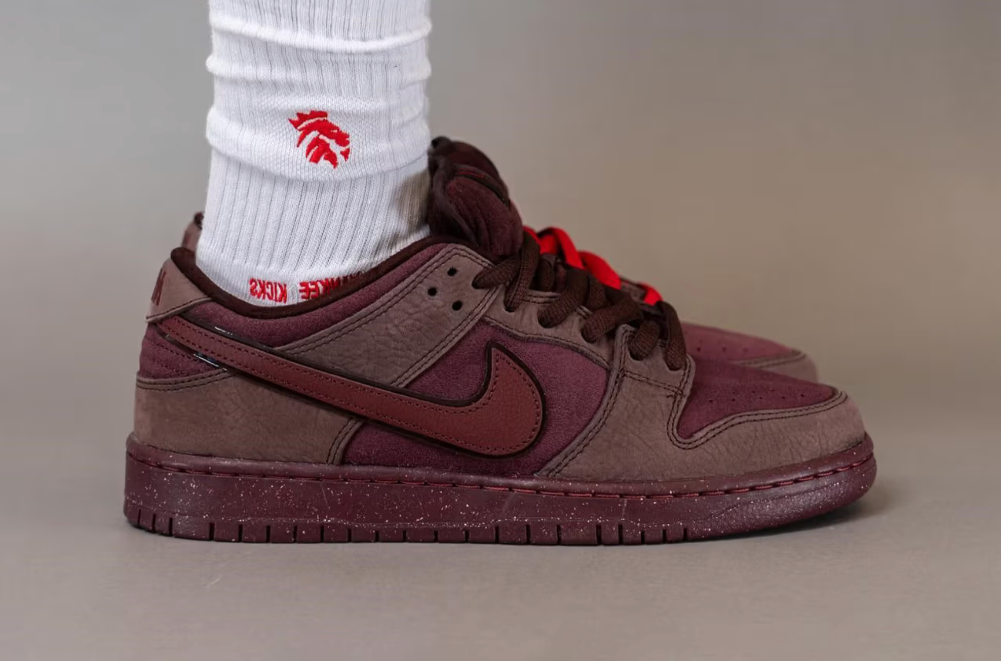 On-Foot Look at the Nike SB Dunk Low "Valentine's Day" The pair is covered in a rich “Burgundy Crush” color.