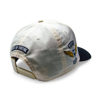 cream and black trucker